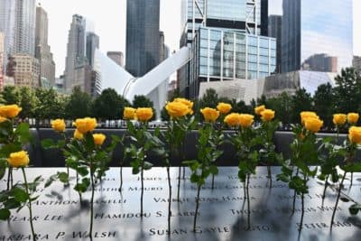 Flowers are placed at the 9/11 Memorial and Museum in New York on Sept. 11, 2020, as the U.S. commemorates the 19th anniversary of the 9/11 attacks. (Angela Weiss/AFP/Getty Images)