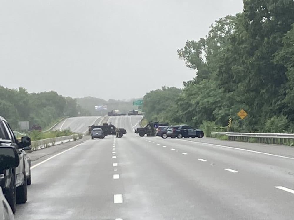 Massachusetts State Police officials shut down a stretch of I-95 in Wakefield in a standoff with a group of heavily armed men Saturday morning. (Courtesy Massachusetts State Police)