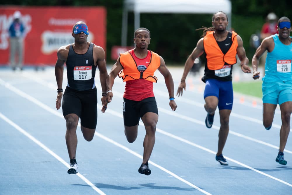 David Brown, left, and guide Moray Steward win the 100 Meter Dash Saturday, June 19, 2021 at the U.S. Paralympic Team Trials for Track and Field in Minneapolis. (Mark Reis)