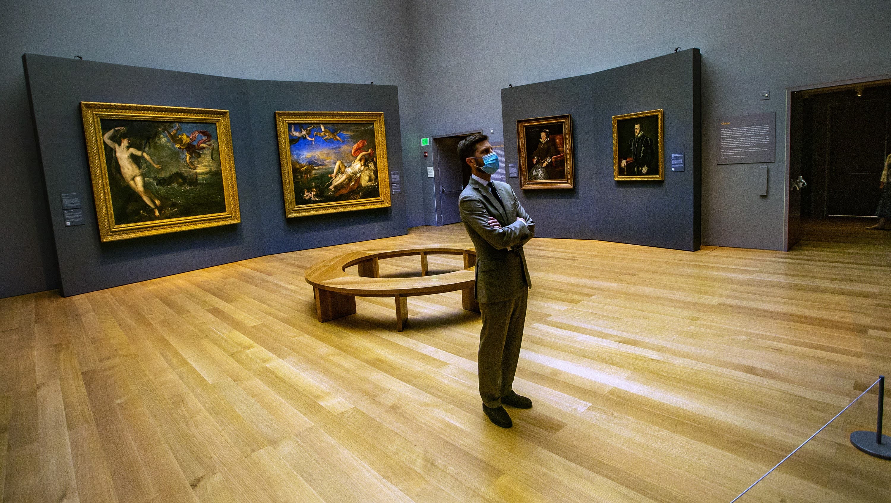 Curator Nat Silver examines Titian’s ‘Venus and Adonis’ during a check of the newly installed exhibit of the artist’s work in the Hostetter Gallery at the Isabella Stewart Gardner Museum. (Jesse Costa/WBUR)