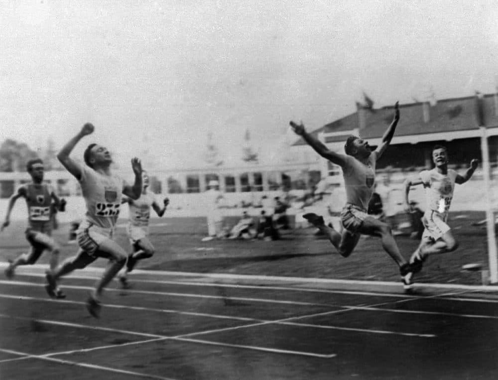 Charles (Charley) Paddock, second from right, of the USA wins the 100 meters final with his famous &quot;flying finish&quot; at the 1920 Summer Olympics in Antwerp, Belgium. Morris Kirksey, far right, of the USA was second, and Jackson Scholz of USA, left, was fourth. Third place Harry Edward not shown. (AP Photo)