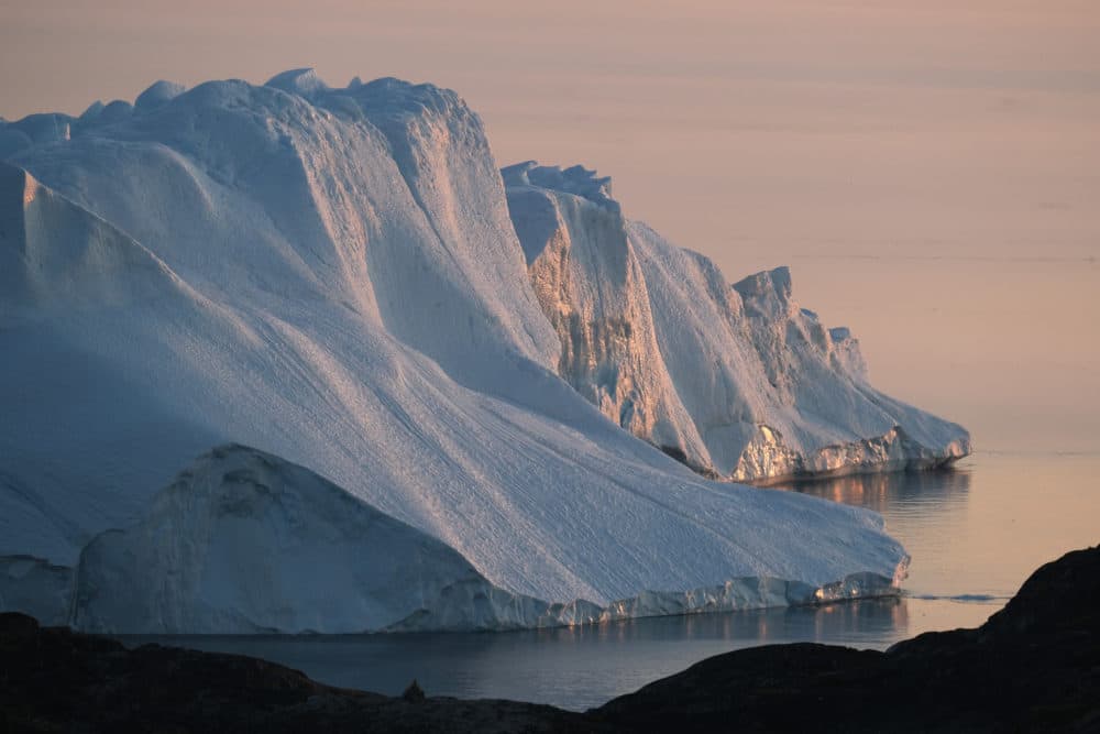 A massive iceberg stands at the mouth of the Ilulissat Icefjord during a week of unseasonably warm weather on Aug. 4, 2019 near Ilulissat, Greenland. (Sean Gallup/Getty Images)