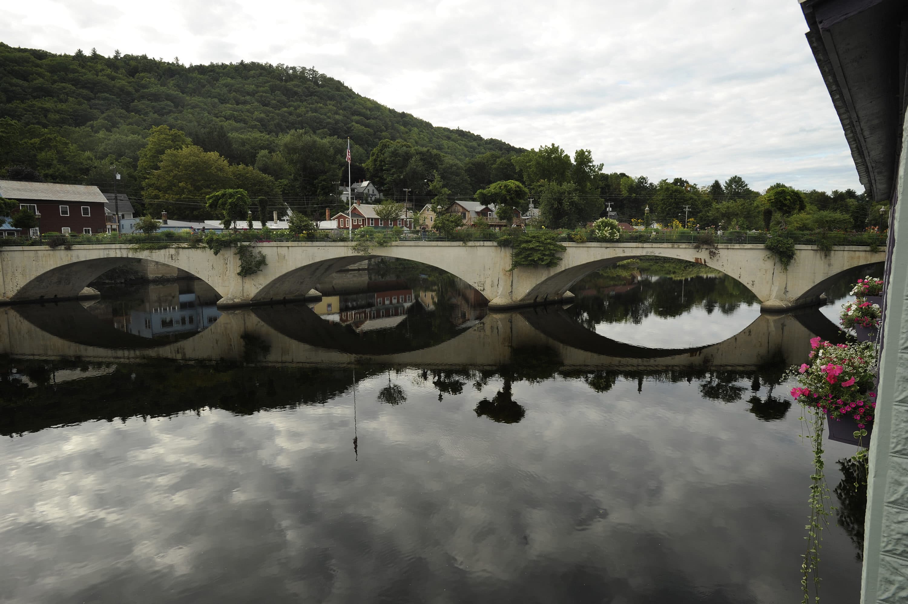 The famous bridge of flowers is the biggest attraction in the town of Shelburne Falls, a village that straddles the towns of Shelburne and Buckland in Western Massachusetts. (Essdras M. Suarez/The Boston Globe via Getty Images)