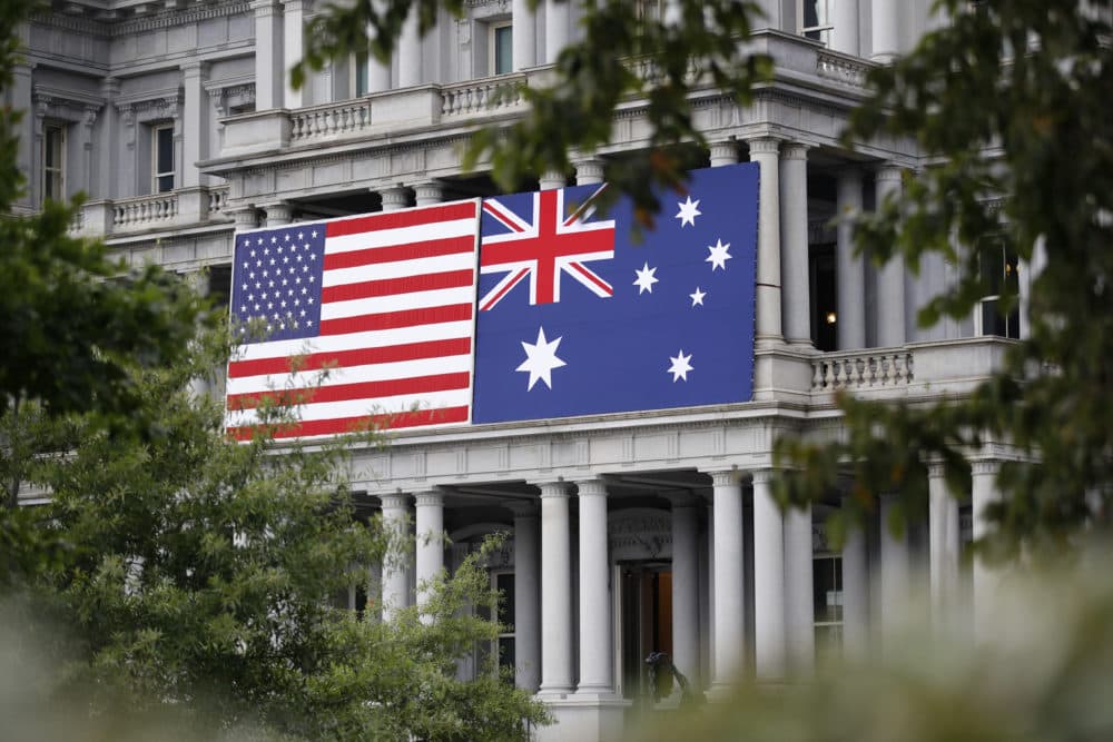 An American and Australian flag hang from the Eisenhower Executive Office Building on the grounds of the White House Complex in Washington, Tuesday, Sept. 17, 2019, ahead of Australian Prime Minister Scott Morrison's state visit. (Patrick Semansky/AP)
