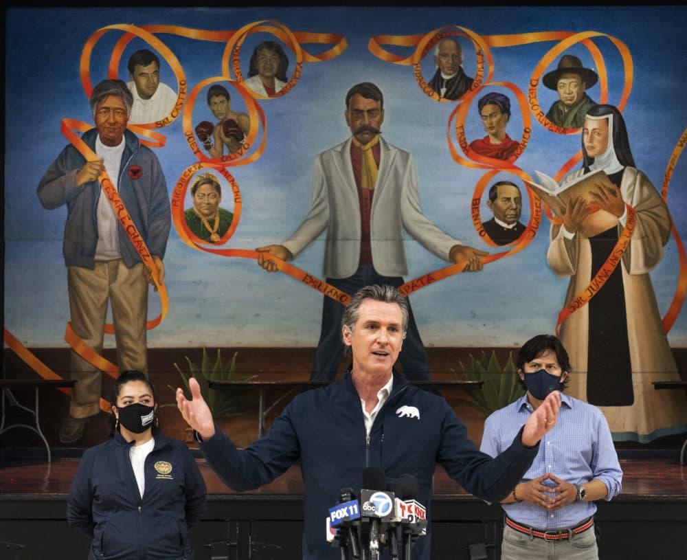 Gov. Gavin Newsom visits the Ramona Gardens Recreation Center in Los Angeles. (AP Photo/Damian Dovarganes, File)