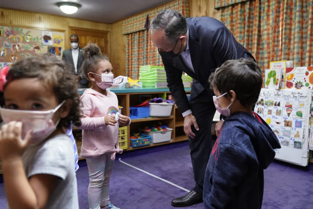 Douglas Emhoff, top right, husband of Vice President Kamala Harris, speaks to pre-school children after reading The Very Hungry Caterpillar, by Eric Carle, at Mother Hubbard Pre-School Center, Monday, Sept. 20, 2021, in Milford, Mass. (Steven Senne/AP Photo)
