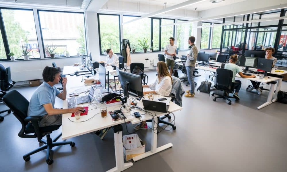 Employees working at an office in the Netherlands on June 28, 2021. (Jeroen Jumelet/Getty Images)