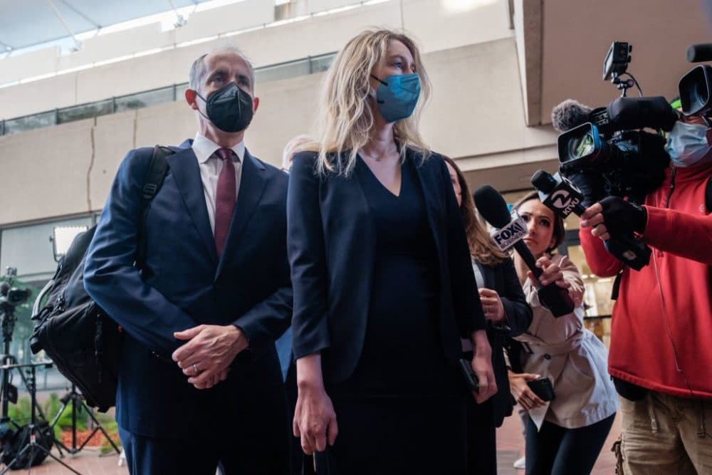 Elizabeth Holmes, the founder and former CEO of blood testing and life sciences company Theranos, arrives for the first day of jury selection in her fraud trial (Nick Otto/ Getty Images)