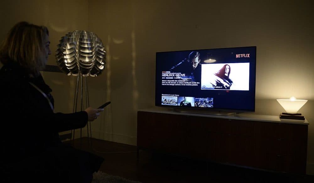 This photo shows a television screen displaying the French user interface of US online streaming giant Netflix (Stephanie De Sakutin/Getty Images)