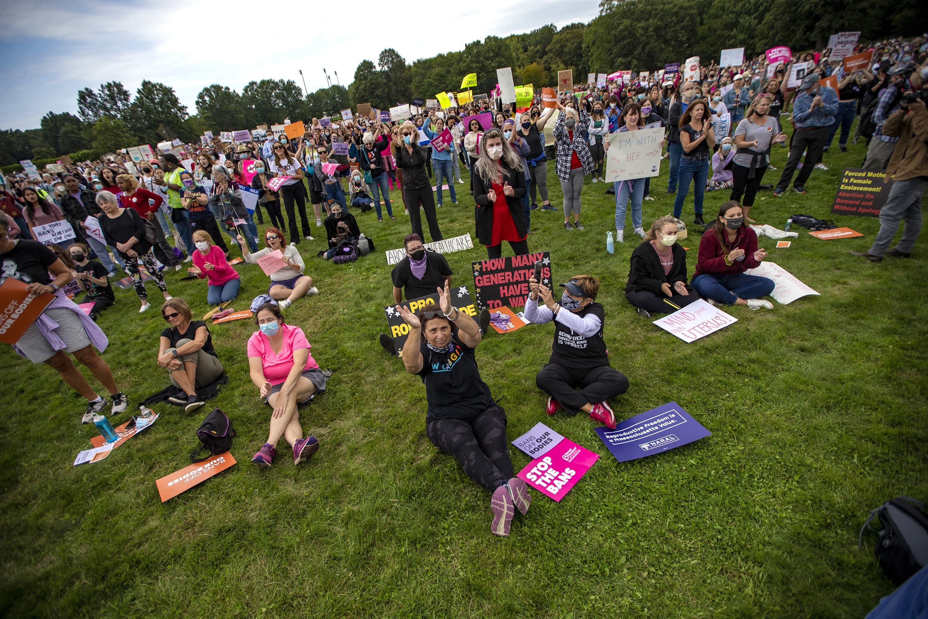 At least 1,000 people gathered at the Franklin Park Playstead to rally as part of nationwide protests happening to defend abortion rights. (Jesse Costa/WBUR)