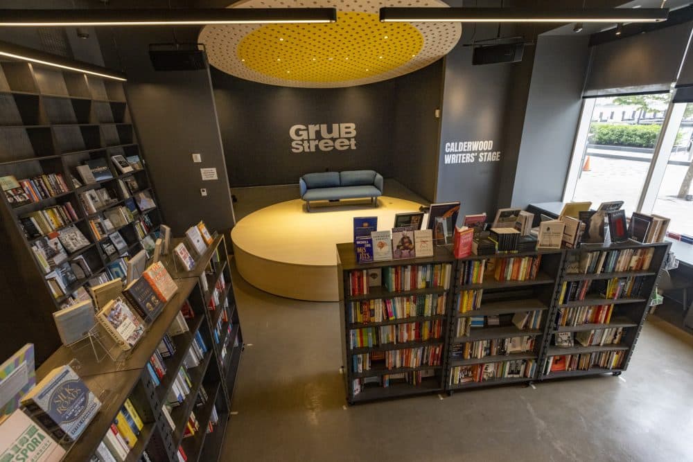 The GrubStreet stage and events area has bookshelves with wheels that can be moved in order to hold large literary gatherings. (Jesse Costa/WBUR)