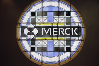 This 2014 file photo shows the Merck logo on a stained glass panel at a Merck company building in Kenilworth, N.J. (Mel Evans/AP File)