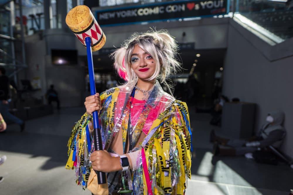 An attendee dressed as Harley Quinn poses during New York Comic Con on Thursday, Oct. 7, 2021, in New York. (Charles Sykes/Invision/AP)