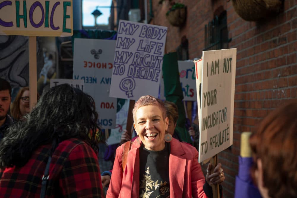 Members of pro choice group Alliance for Choice smile at one another following a press conference on October 21, 2019 in Belfast, Northern Ireland. (Charles McQuillan/Getty Images)