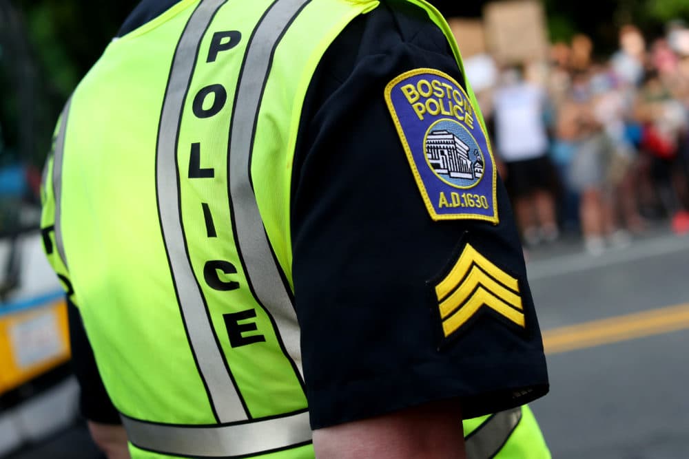 A Boston police officer stood outside a protest in June 2020.