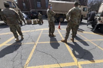 Members of the National Guard, photographed outside Chelsea City Hall in April 2020. (Michael Dwyer/AP)