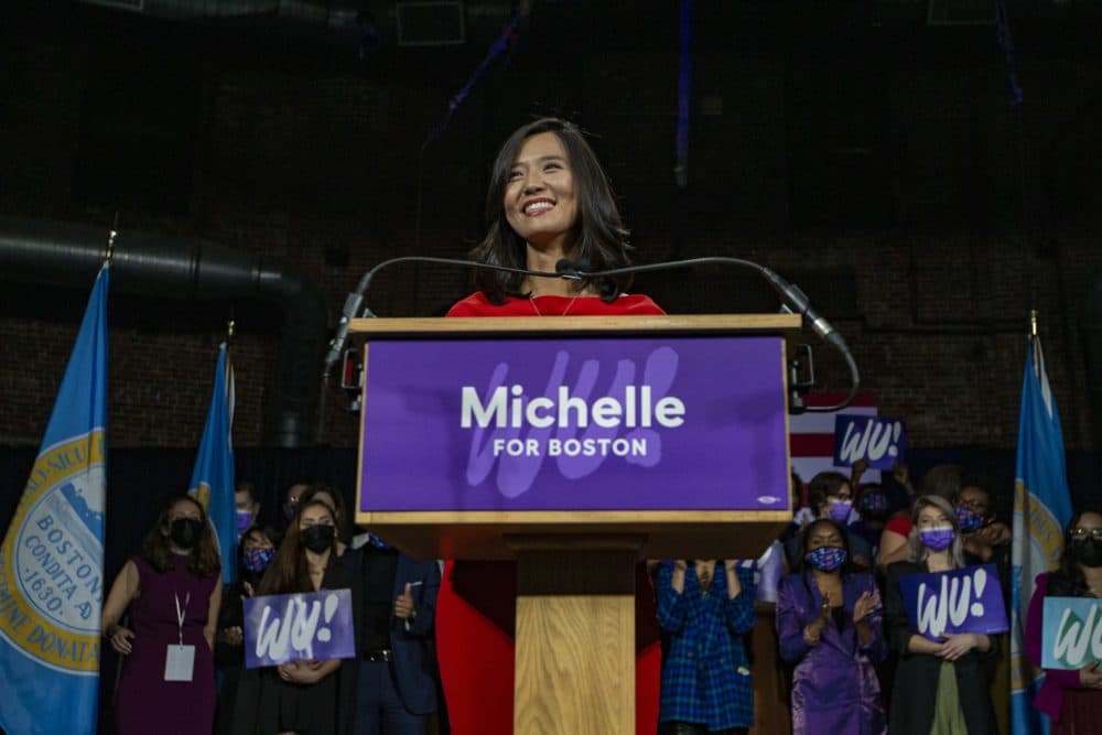 Michelle Wu smiles as she speaks to supporters after winning the election becoming the first woman to be elected Mayor of Boston. (Jesse Costa/WBUR)