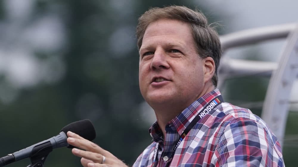 Republican New Hampshire Gov. Chris Sununu addresses racing fans at a NASCAR Cup Series auto race, July 18, 2021, in Loudon, N.H. (Charles Krupa/AP File)