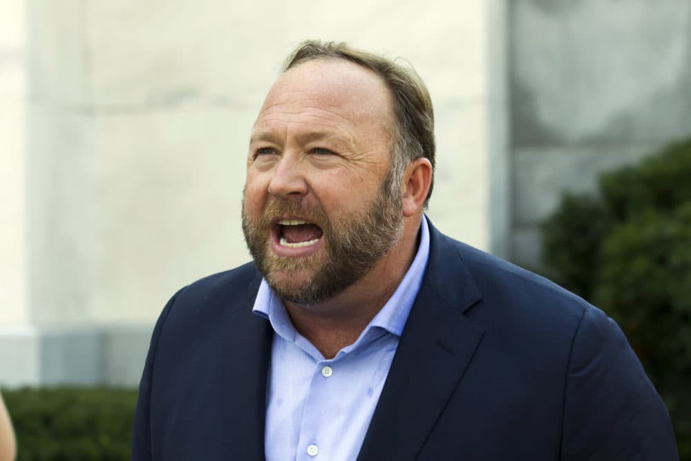 Infowars host and conspiracy theorist Alex Jones speaks outside of the Dirksen building on Capitol Hill in Washington in 2018. (Jose Luis Magana/AP)