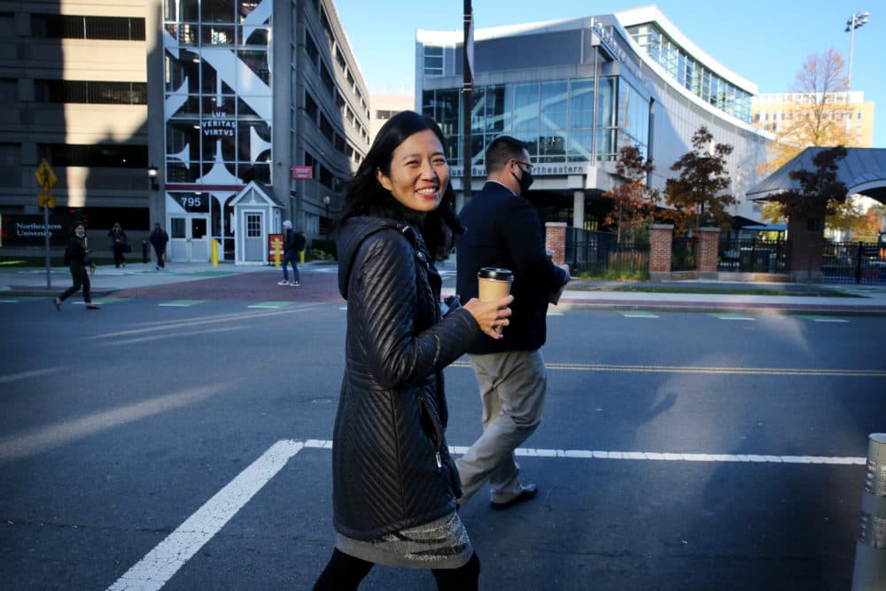 Mayor-Elect Michelle Wu departs after visiting The Underground Cafe and Lounge in Roxbury on Nov. 03, 2021. (Craig F. Walker/The Boston Globe via Getty Images)