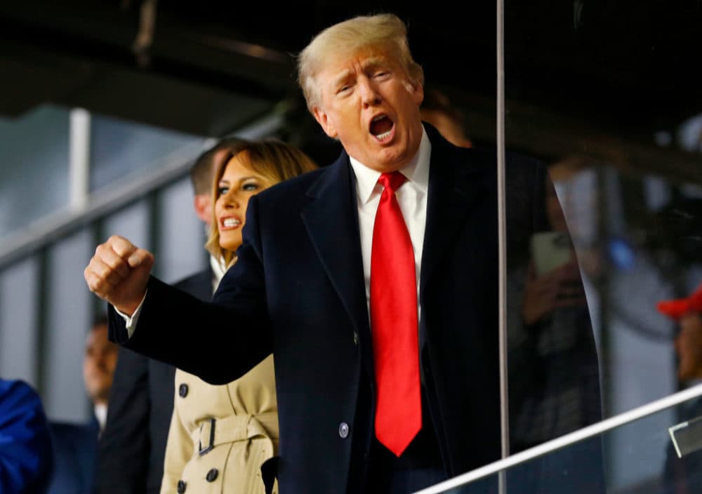 Former president Donald Trump waves prior to Game Four of the World Series between the Houston Astros and the Atlanta Braves Truist Park on October 30, 2021 in Atlanta, Georgia. (Michael Zarrilli/Getty Images)