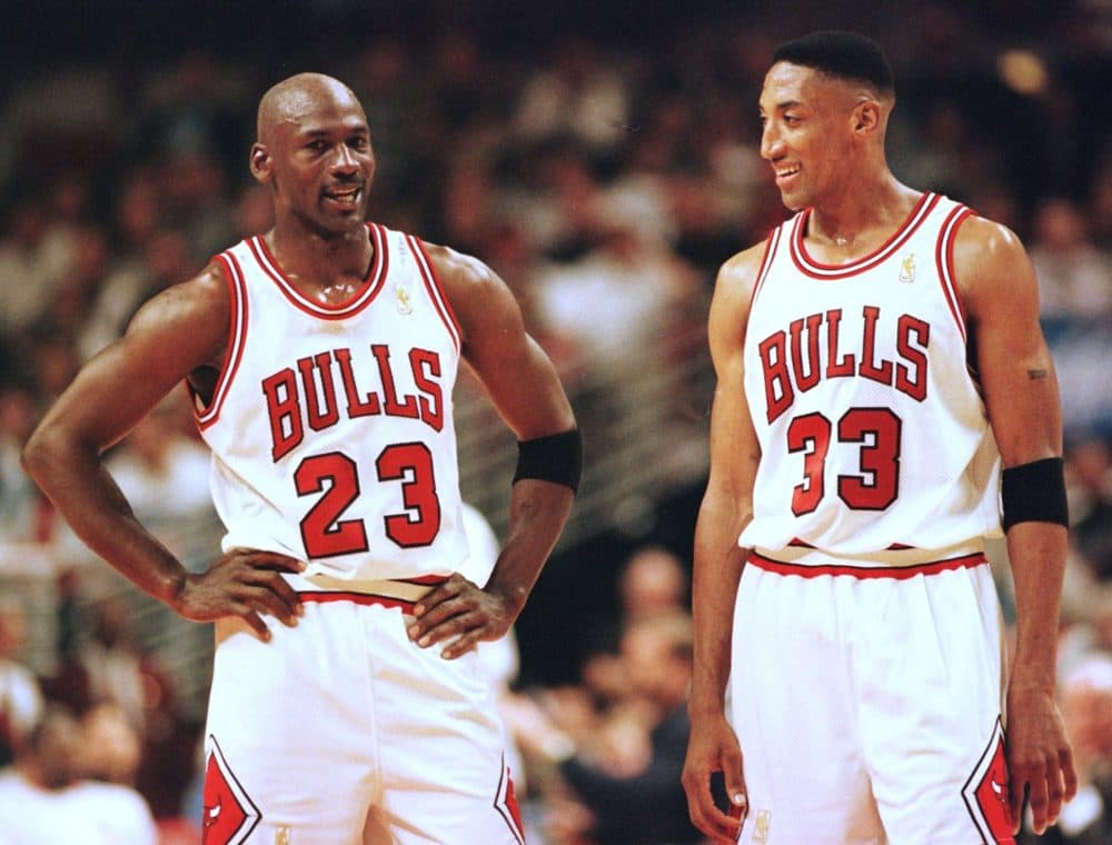 Michael Jordan (L) and Scottie Pippen (R) of the Chicago Bulls talk during the final minutes of their game on May 22, 1997 in the NBA Eastern Conference finals against the Miami Heat at the United Center in Chicago, Illinois.(Vincent Laforet/AFP via Getty Images)