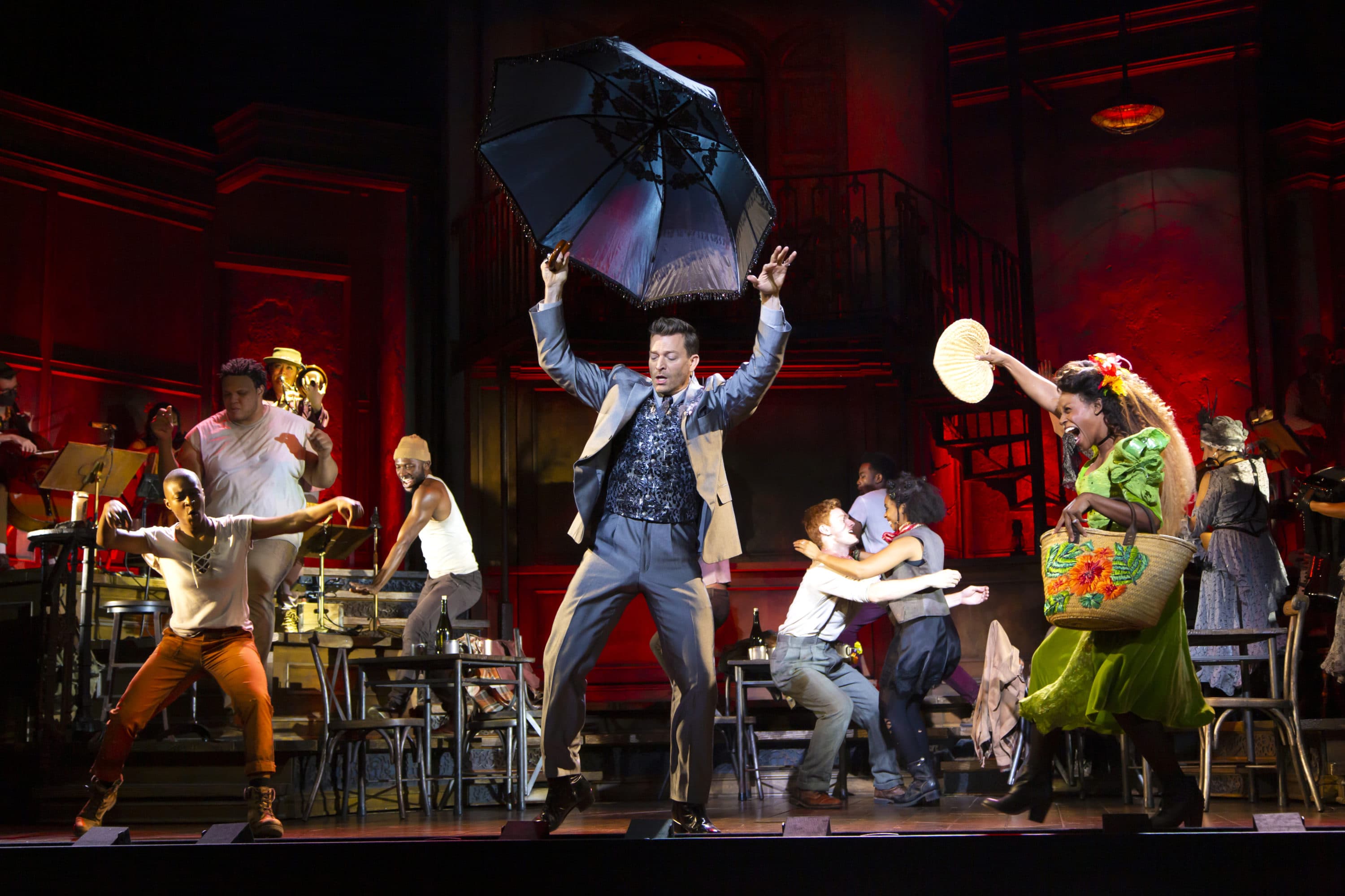 Levi Kreis as Hermes and the cast of &quot;Hadestown.&quot; (Courtesy T Charles Erickson)