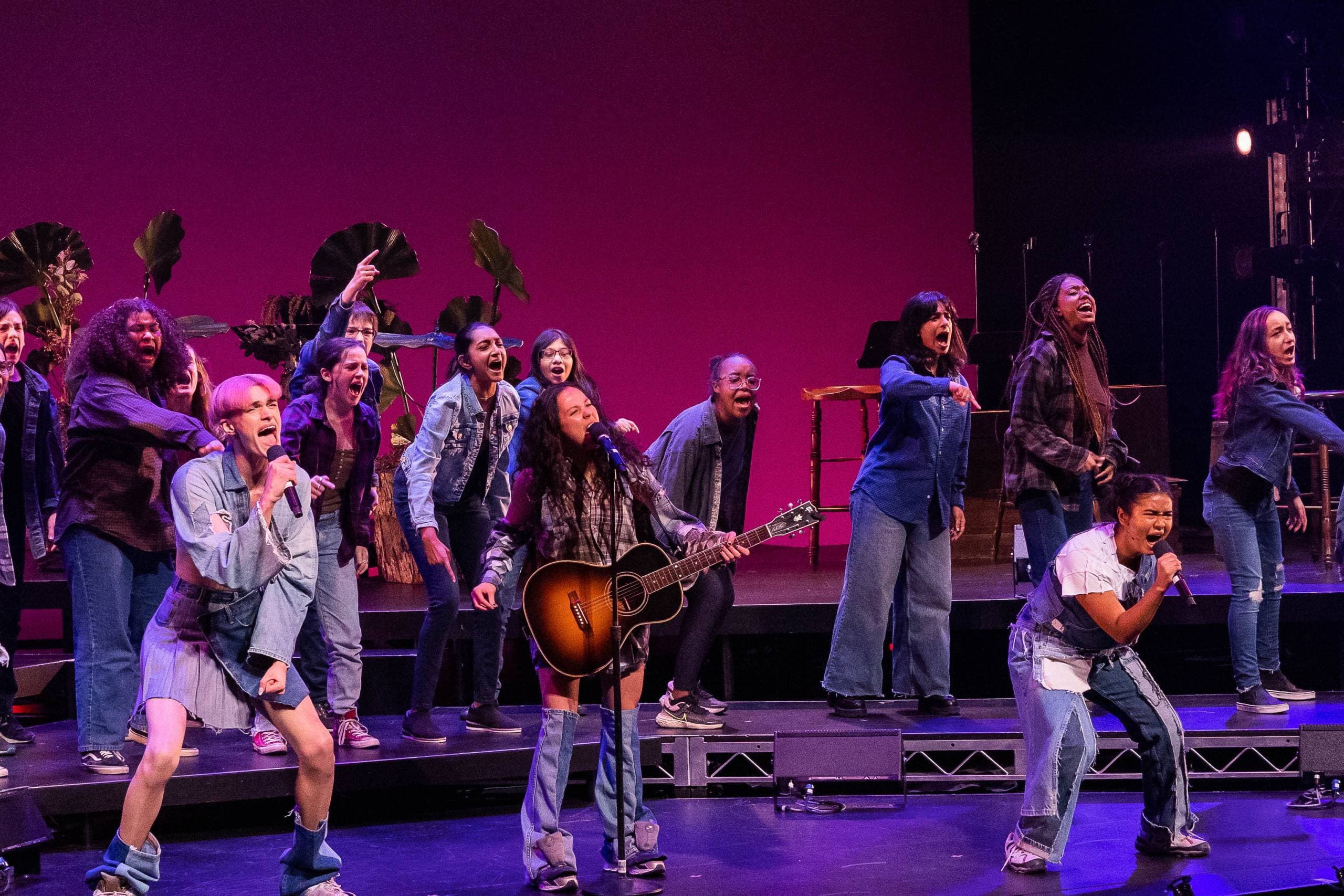 In the foreground, left to right, Luke Ferrari as Possible, YDE as Sophia, and Paravi Das as Forte with members of the Boston Children’s Chorus in &quot;WILD: A Musical Becoming.&quot; (Courtesy Maggie Hall/Nile Scott Studios)