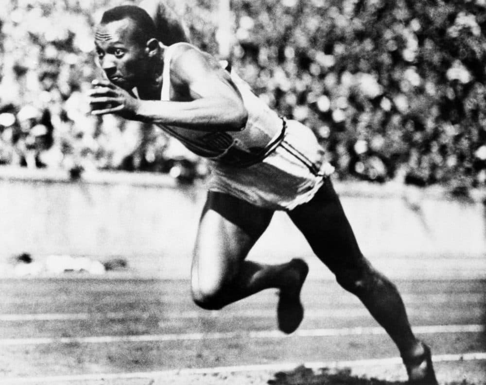 On Aug. 14, 1936, Jesse Owens competes in one of the heats of the 200-meter run at the 1936 Olympic Games in Berlin. (AP Photo/File)