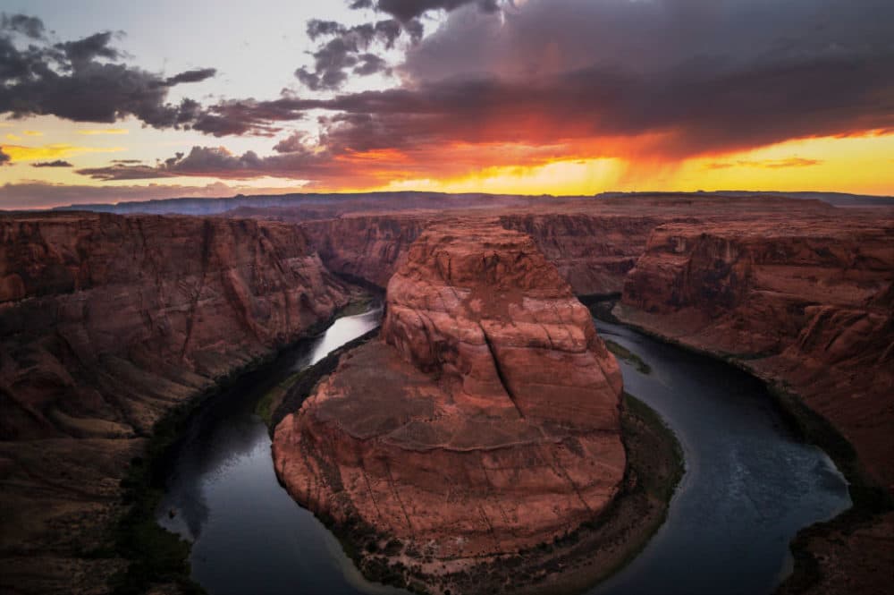 The Colorado River winds through Horseshoe Bend in the Glen Canyon National Recreation Area in Page, Ariz., at sunset on Aug. 25, 2021. (Bill Clark/CQ-Roll Call, Inc via Getty Images)