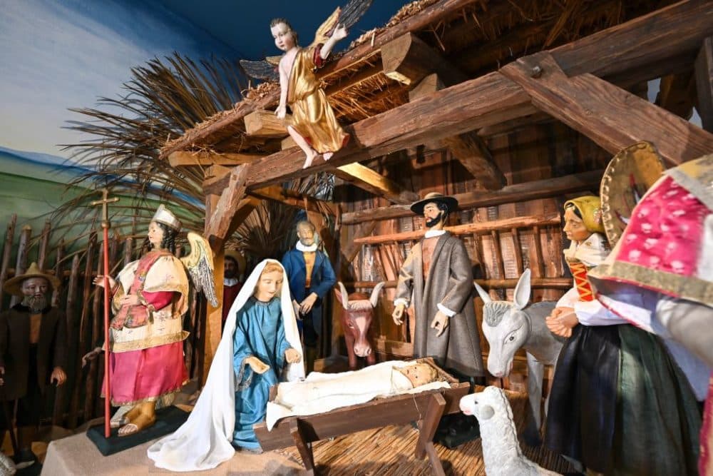 The baroque nativity scene with several figures is set up in the foyer of the Benedictine Abbey of St. Erentraud in Kellenried, Germany on December 17, 2021. (Felix Kästle/picture alliance via Getty Images)