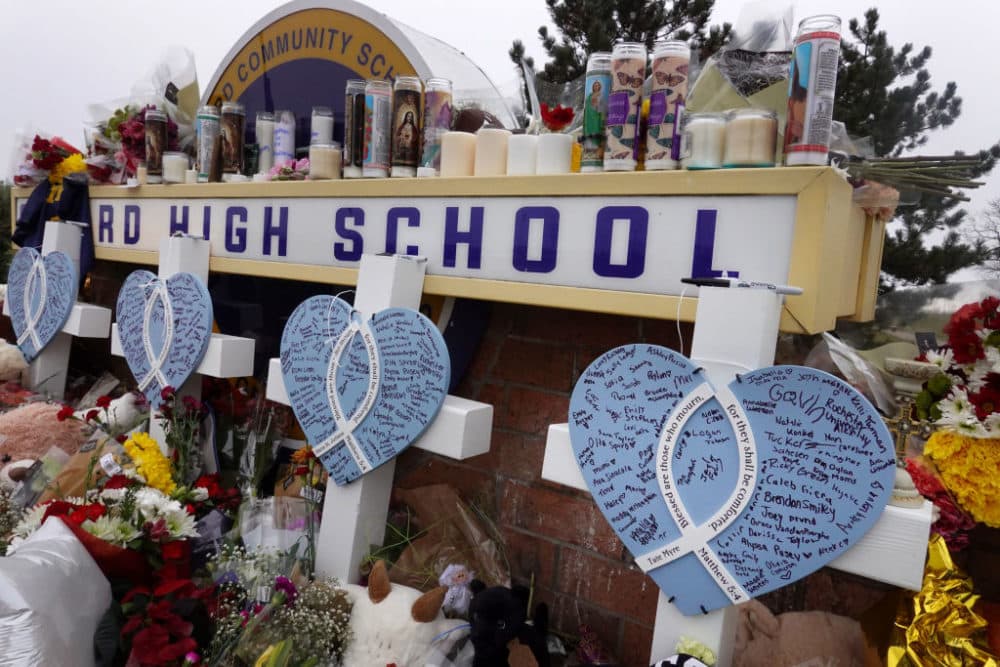 A memorial outside of Oxford High School continues to grow on Dec. 3, 2021, in Oxford, Michigan. Four students were killed and seven others injured on Nov.30, when student Ethan Crumbley allegedly opened fire with a pistol at the school. (Scott Olson/Getty Images)