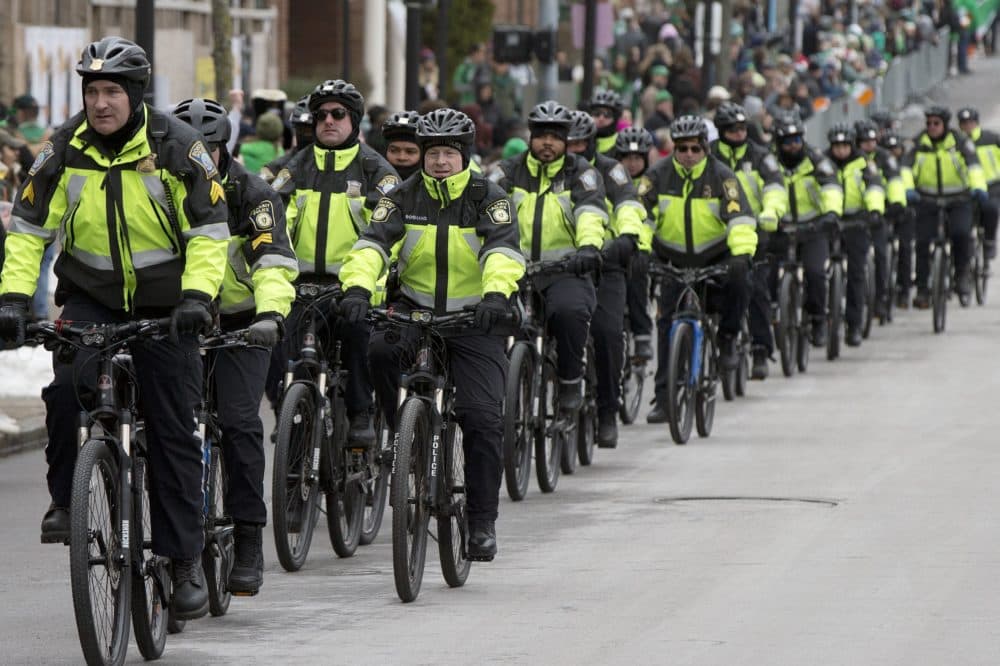In this March 19, 2017, file photo, Boston Police patrol on bicycles during the annual St. Patrick's Day Parade in Boston. (Michael Dwyer/AP File)