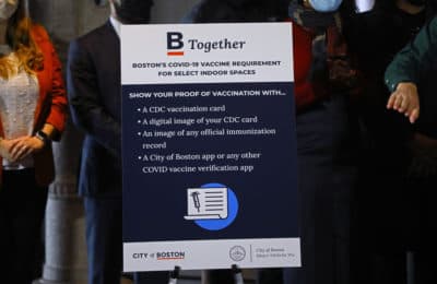 Boston Mayor Michelle Wu held a press conference in City Hall on Dec. 20, 2021, to discuss the city's response to the ongoing coronavirus pandemic. She announced a vaccine mandate to enter businesses in Boston. (Pat Greenhouse/The Boston Globe via Getty Images)