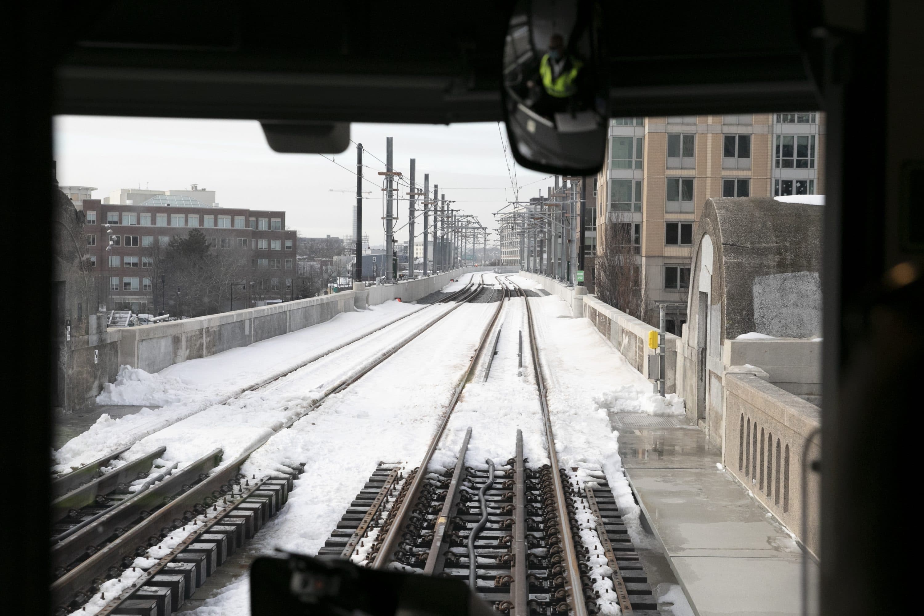A Green Line train proceeds onto a stretch of brand-new tracks between Science Park and a freshly constructed Lechmere Station, part of the infrastructure the MBTA built for its first Green Line Extension branch into Somerville's Union Square that will open to commuters in March. (Chris Lisinski/SHNS)