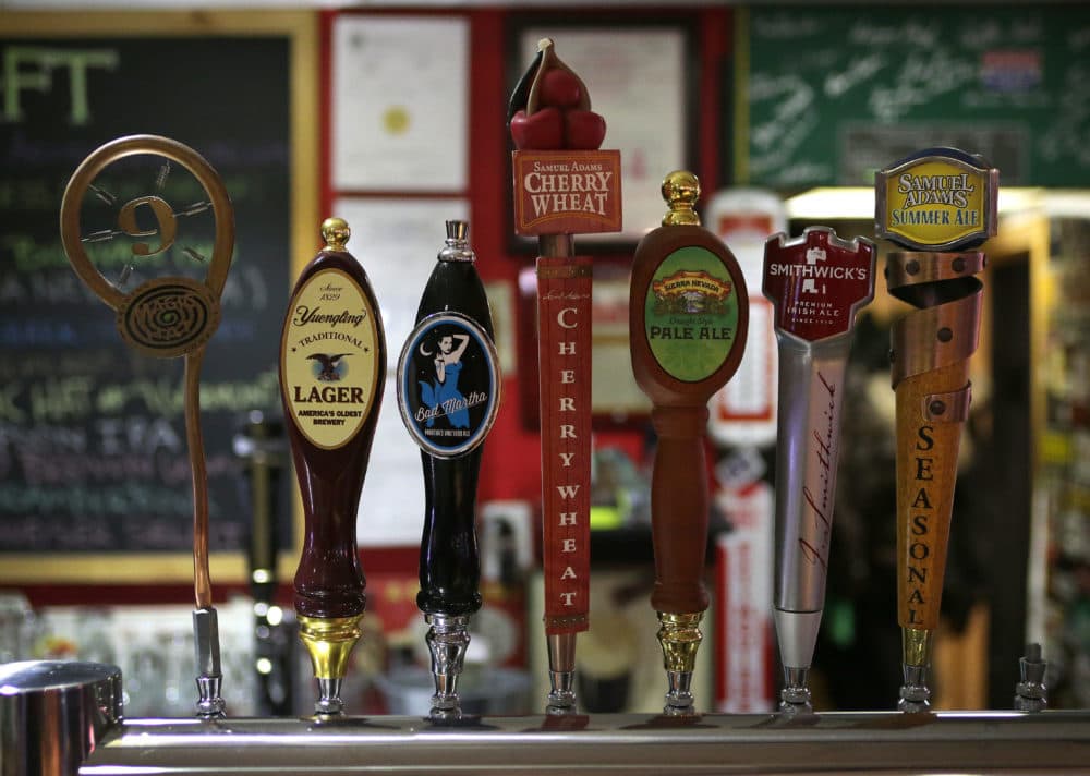 Beer taps at a pub in Boston. (Barry Chin/The Boston Globe via Getty Images)