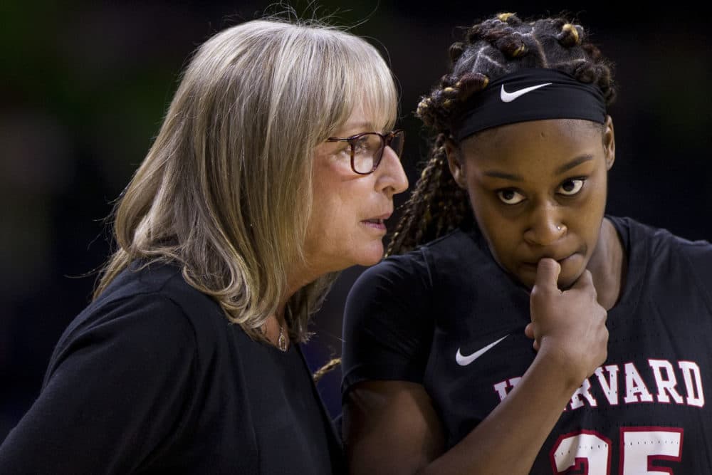 Harvard head coach Kathy Delaney-Smith, left, talks to Sydney Skinner (25) during the first half of an NCAA college basketball game against Notre Dame in 2018. Delaney-Smith is retiring after 40 years as Harvard's women's basketball coach, at the end of the 2021-2022 season. (Robert Franklin/AP)