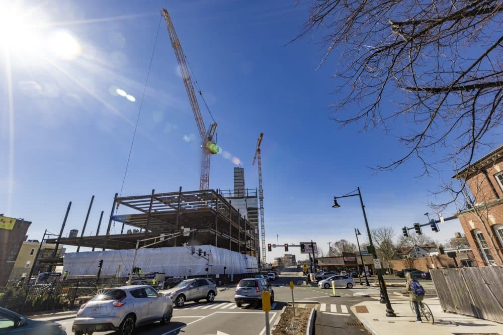 The USQ development at 10 Prospect St. is under construction in Union Square, Somerville. (Jesse Costa/WBUR)