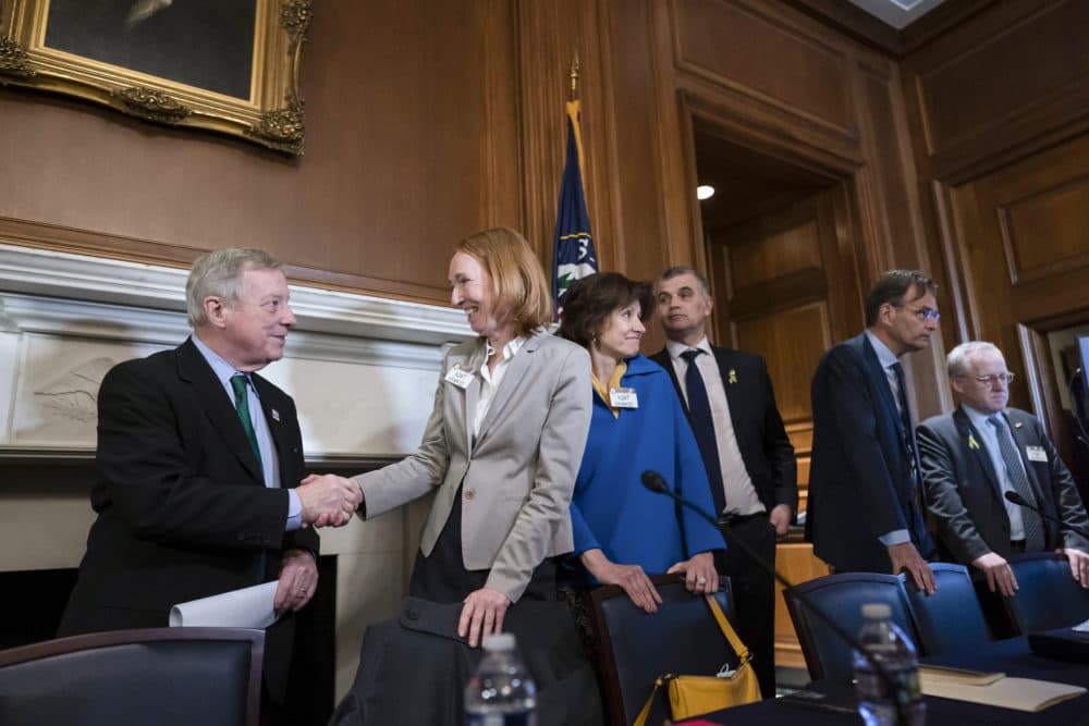 Sen. Dick Durbin, D-Ill., welcomes German Ambassador Emily Haber and other European diplomats to discuss the Russian invasion of Ukraine, at the Capitol in Washington, Thursday, March 10, 2022. (J. Scott Applewhite/AP)