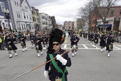 Members of the Boston Police Gaelic Column of Pipes and Drums march during the St. Patrick's Day parade on Sunday. (Steven Senne/AP)