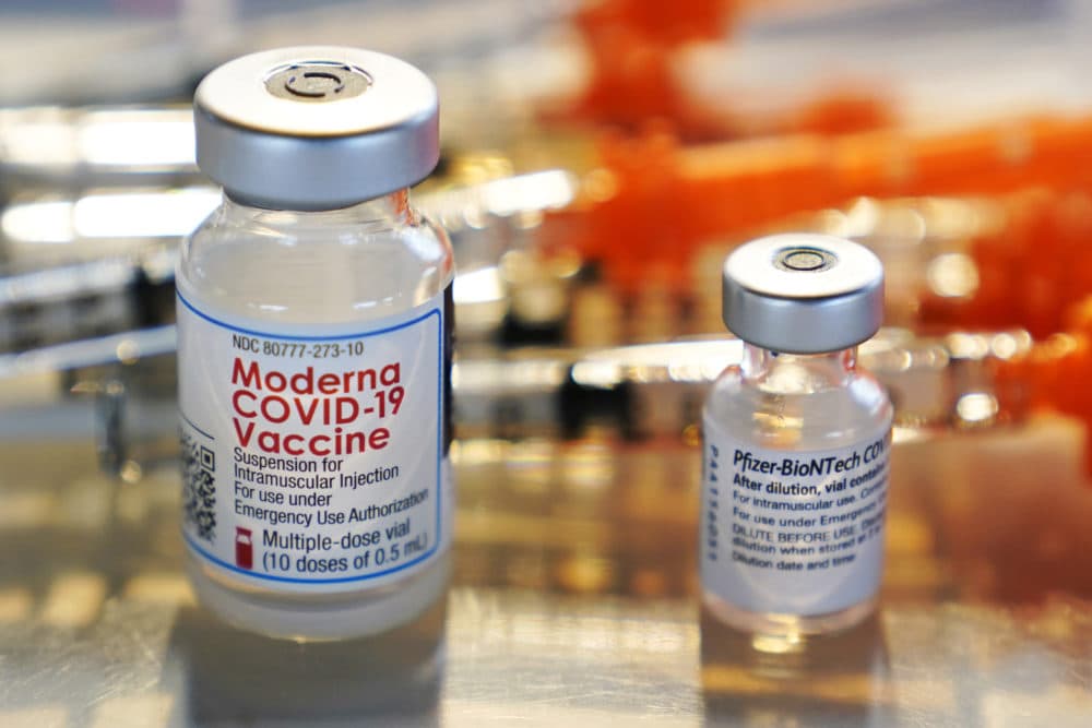 Vials for the Moderna and Pfizer COVID-19 vaccines. (Charles Krupa/AP)