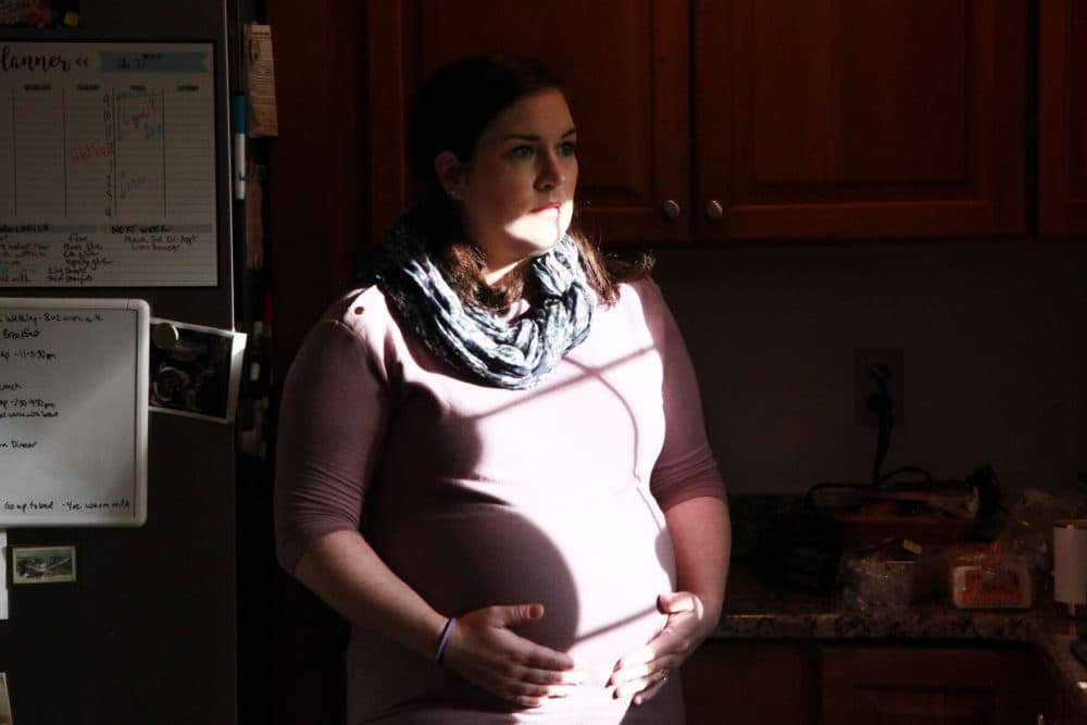 Lisa Akey was 21 weeks pregnant, doctors told her one twin had no chance of surviving outside the womb. That twin also threatened the life of the other, healthy twin. (Gaby Lozada/NHPR)