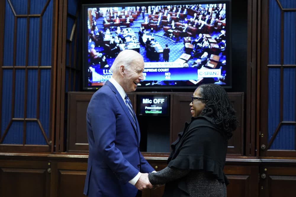 President Biden talks with Supreme Court nominee Judge Ketanji Brown Jackson as they watch the Senate vote on her confirmation from the Roosevelt Room of the White House in Washington, Thursday, April 7, 2022. (Susan Walsh/AP)