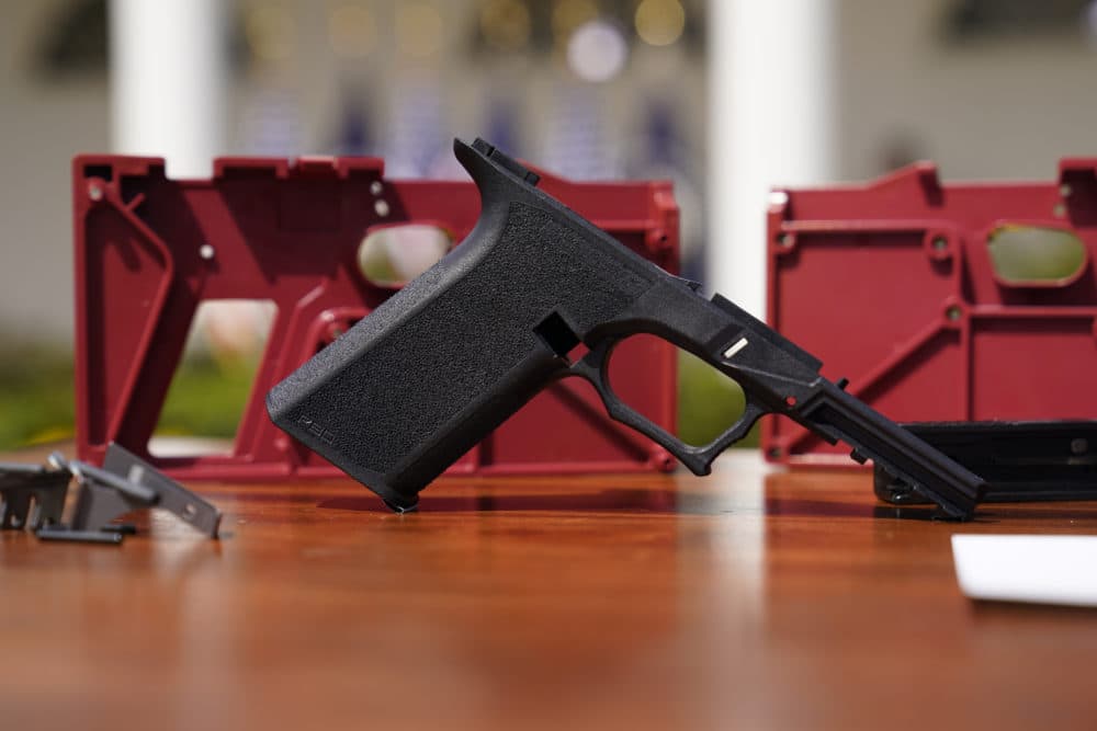 A 9mm pistol build kit with a commercial slide and barrel with a polymer frame is displayed before President Biden and Deputy Attorney General Lisa Monaco speak in the Rose Garden of the White House in Washington, Monday, April 11, 2022, to announces a final version of its ghost gun rule, which comes with the White House and the Justice Department under growing pressure to crack down on gun deaths. (Carolyn Kaster/AP)