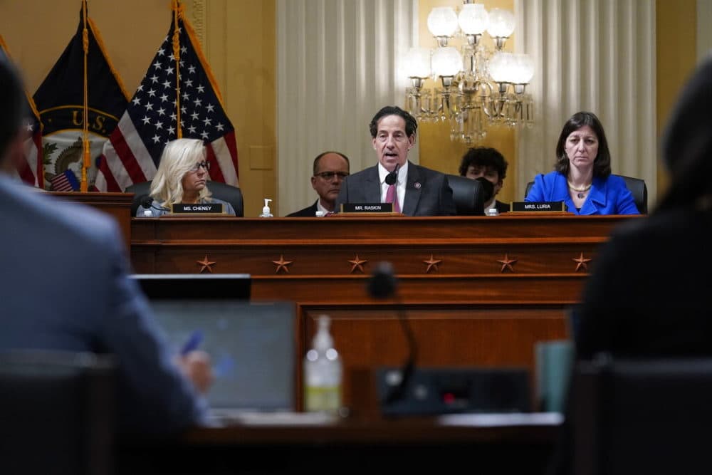 Rep. Jamie Raskin, D-Md., center, flanked by Vice Chair Liz Cheney, R-Wyo., left, and Rep. Elaine Luria, D-Va., speaks as the House committee investigating the Jan. 6 attack on the U.S. Capitol pushes ahead with contempt charges against former Trump advisers Peter Navarro and Dan Scavino in response to their refusal to comply with subpoenas, at the Capitol in Washington, Monday, March 28, 2022. Navarro, President Donald Trump's trade adviser, and Scavino, a White House communications aide under Trump, have been uncooperative in the congressional probe into the deadly 2021 insurrection. (AP Photo/J. Scott Applewhite)