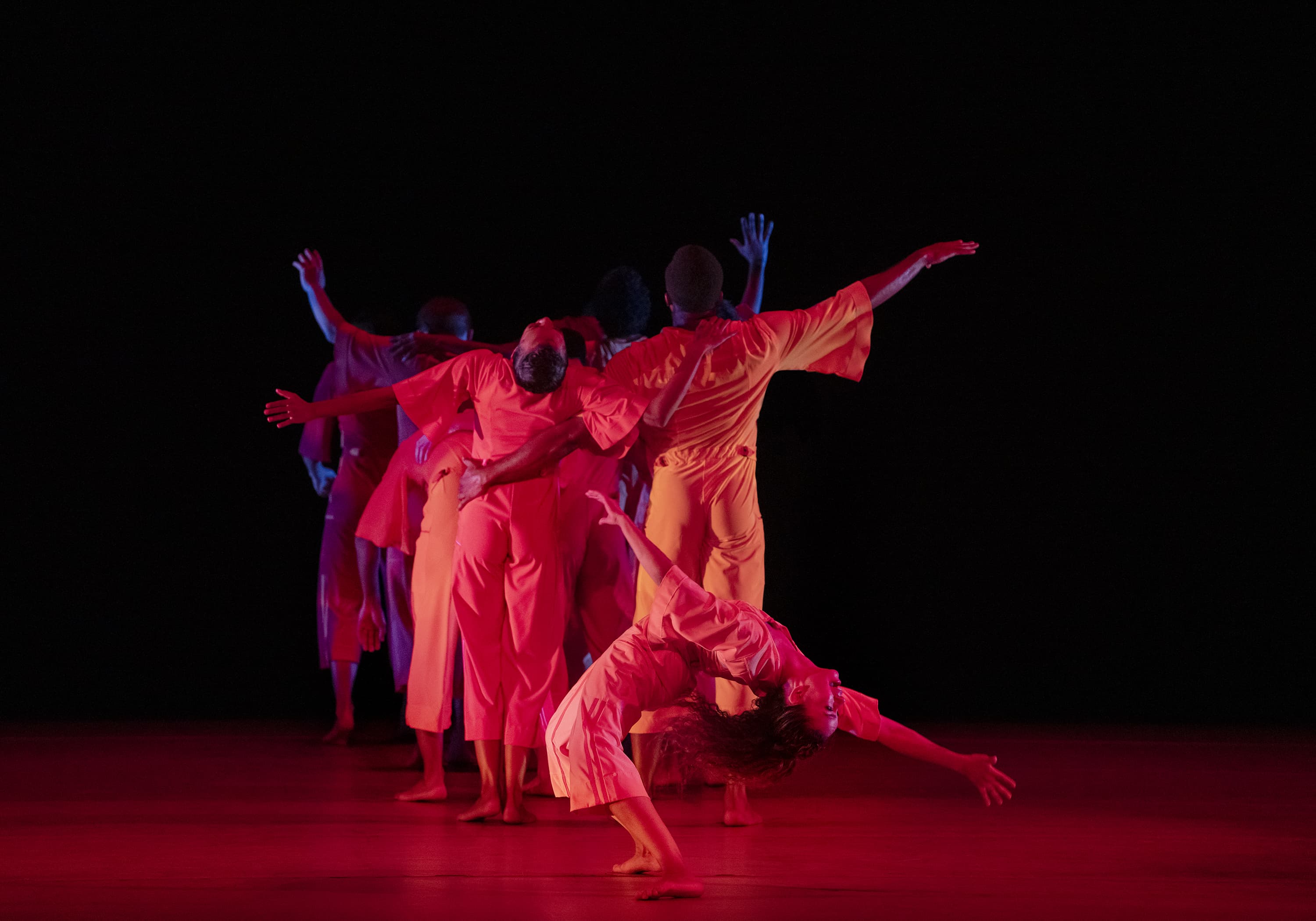 Belén Indhira Pereyra (front) and other members of Alvin Ailey American Dance Theater in Robert Battle's excerpt from Love Stories. (Courtesy Paul Kolnik)