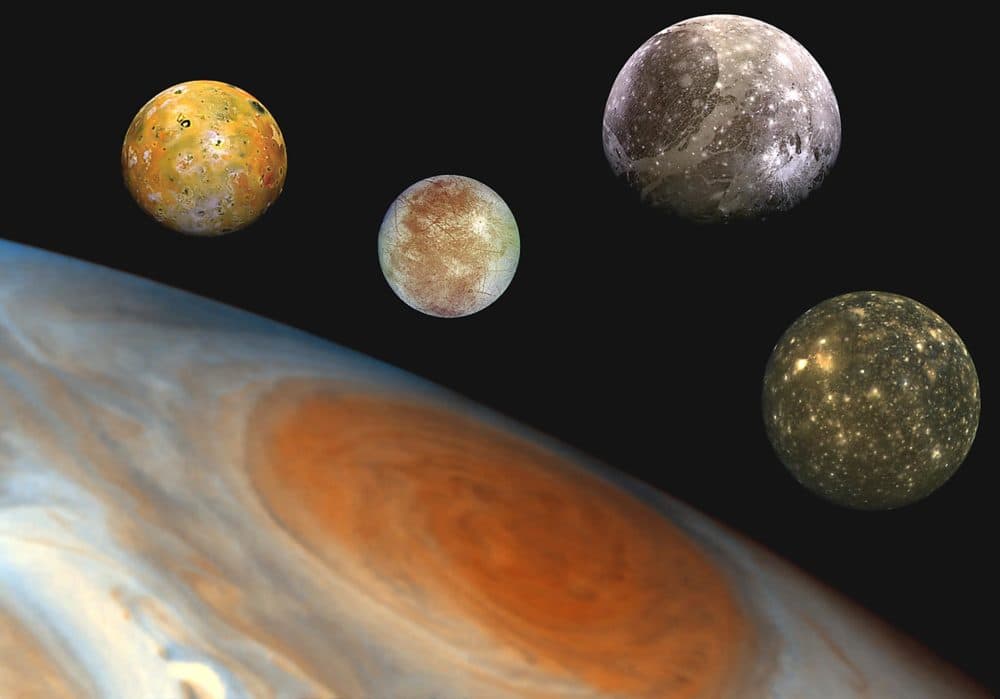 This NASA file composite image shows the Jovian system, including the edge of Jupiter with its Great Red Spot, and Jupiter's four largest moons, known as the Galilean satellites. From left to right, the moons shown are Io, Europa, Ganymede and Callisto. (NASA/AFP via Getty Images)