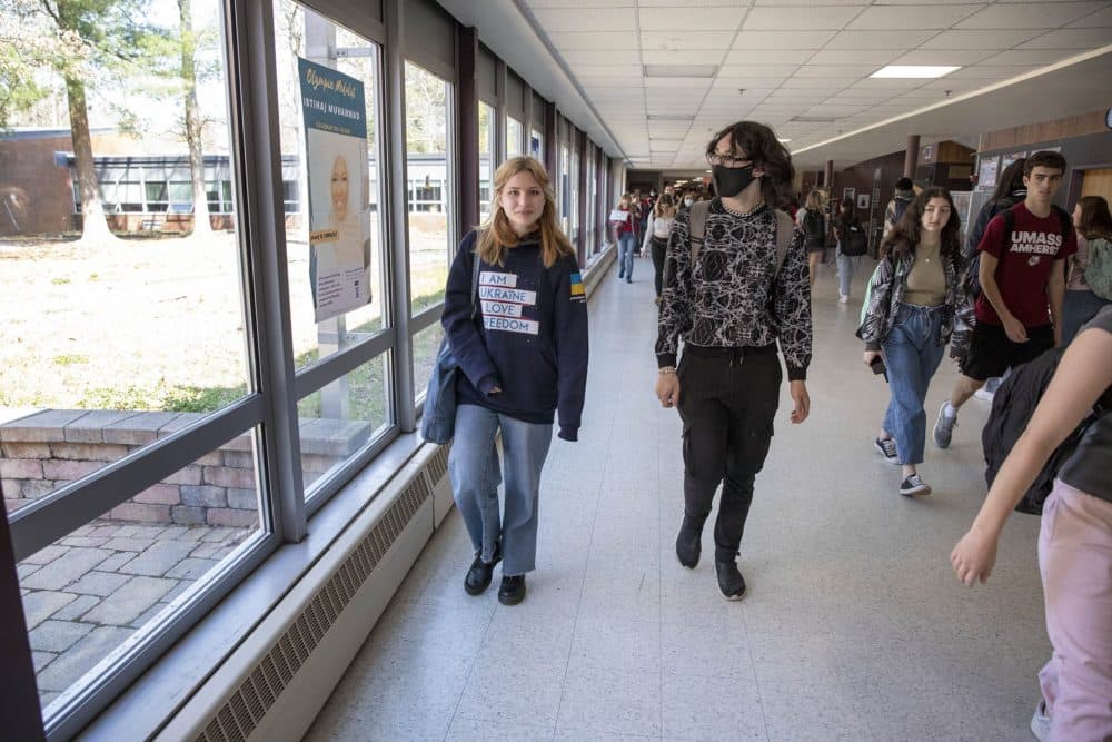 Pokliatska walks with schoolmate Tiago Rodriguez between classes. (Robin Lubbock/WBUR)