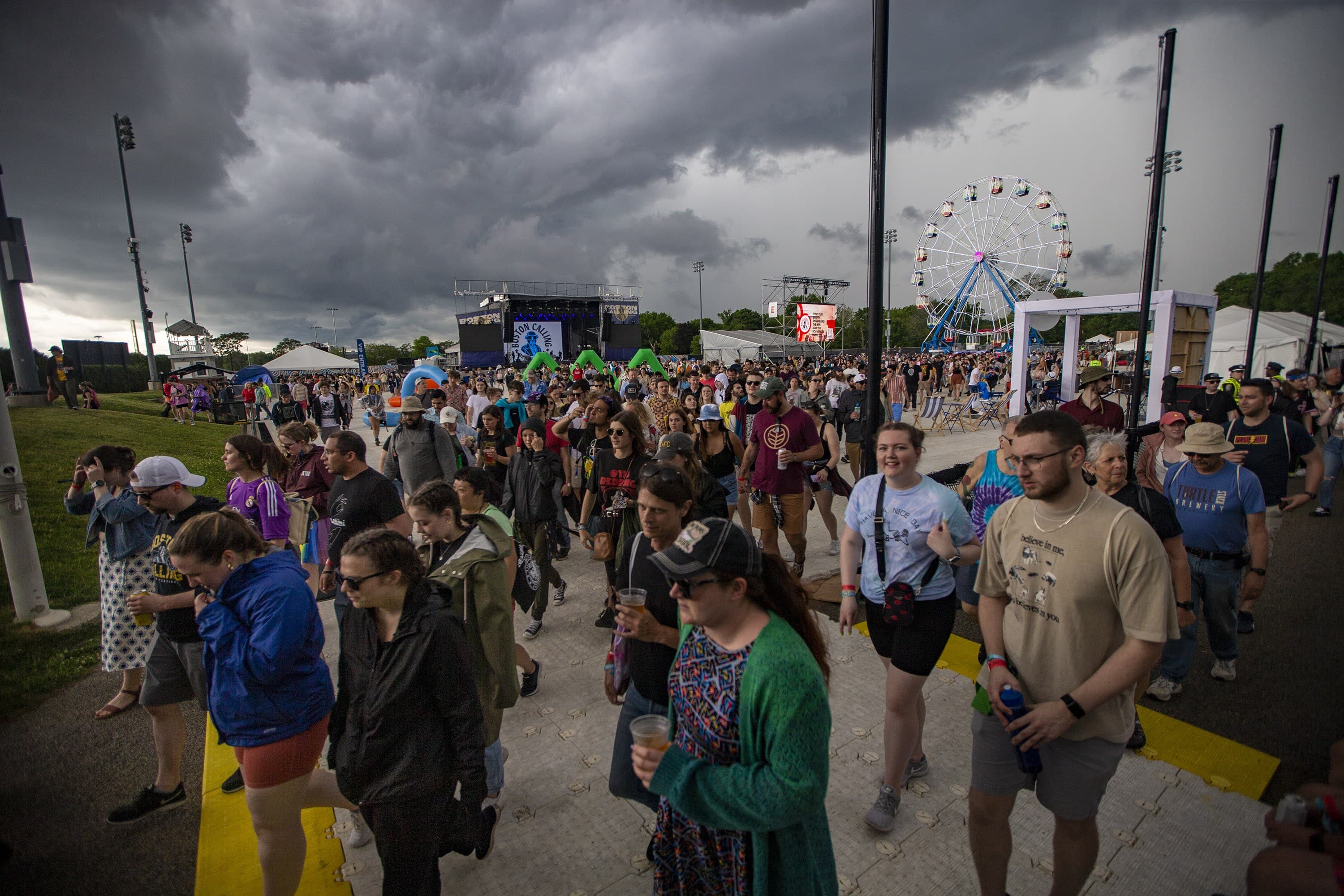 Festival-goers at Boston Calling are evacuated due to severe weather Saturday afternoon. (Jesse Costa/WBUR)