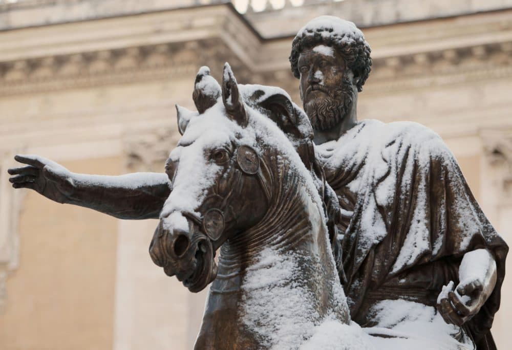 The bronze equestrian statue of Roman Emperor Marcus Aurelius is covered by snow in Rome, Saturday, Feb. 11, 2012. (Gregorio Borgia/AP)